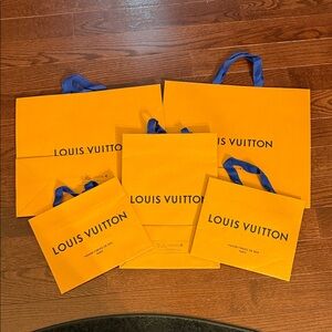 Louis Vuitton Bold Orange Bags with Blue Accents